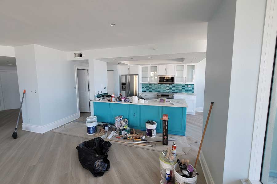 In-progress kitchen addition with blue cabinets